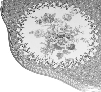 Porcelain plate of a small corner console table