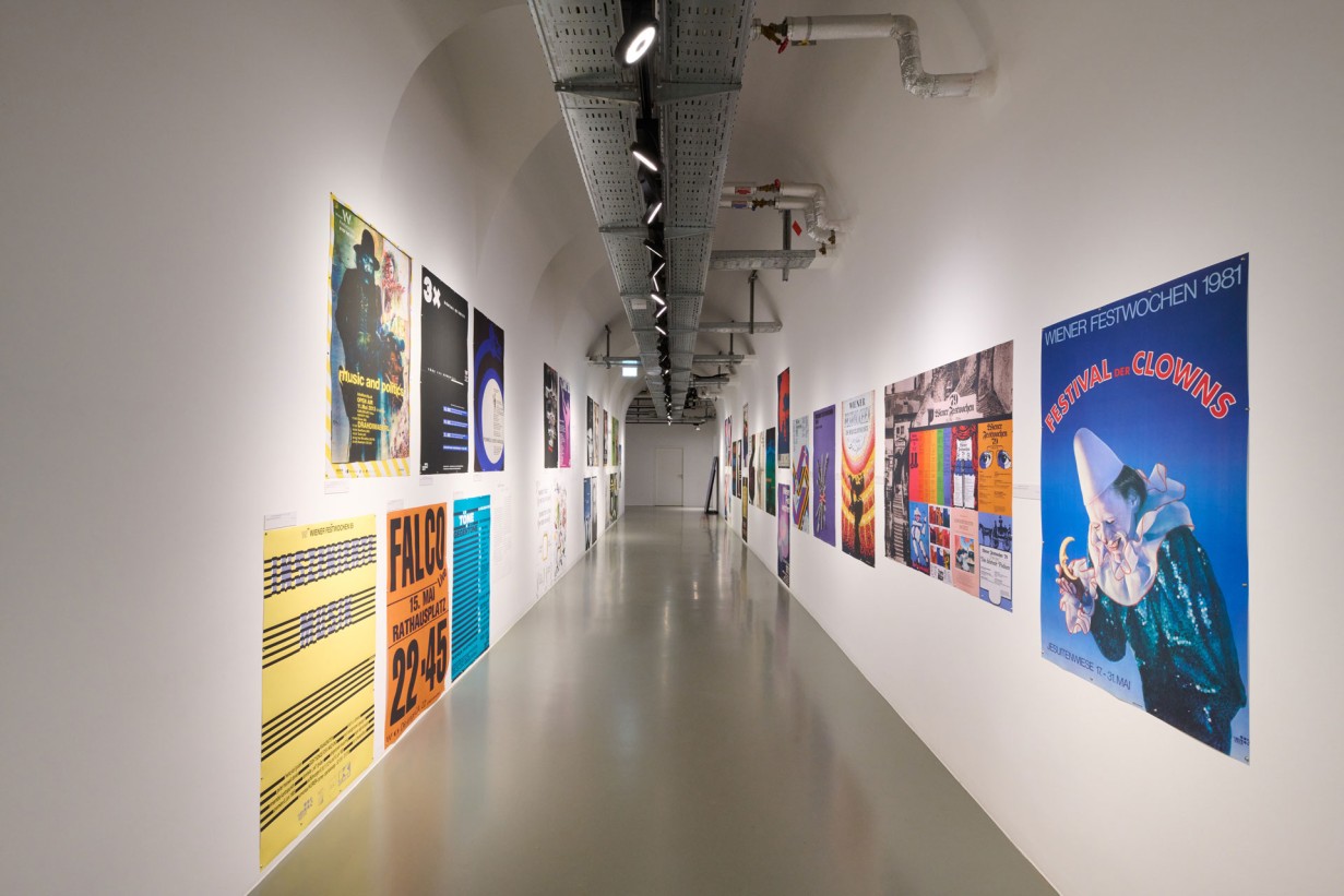 A hallway with Vienna Festival posters on the walls