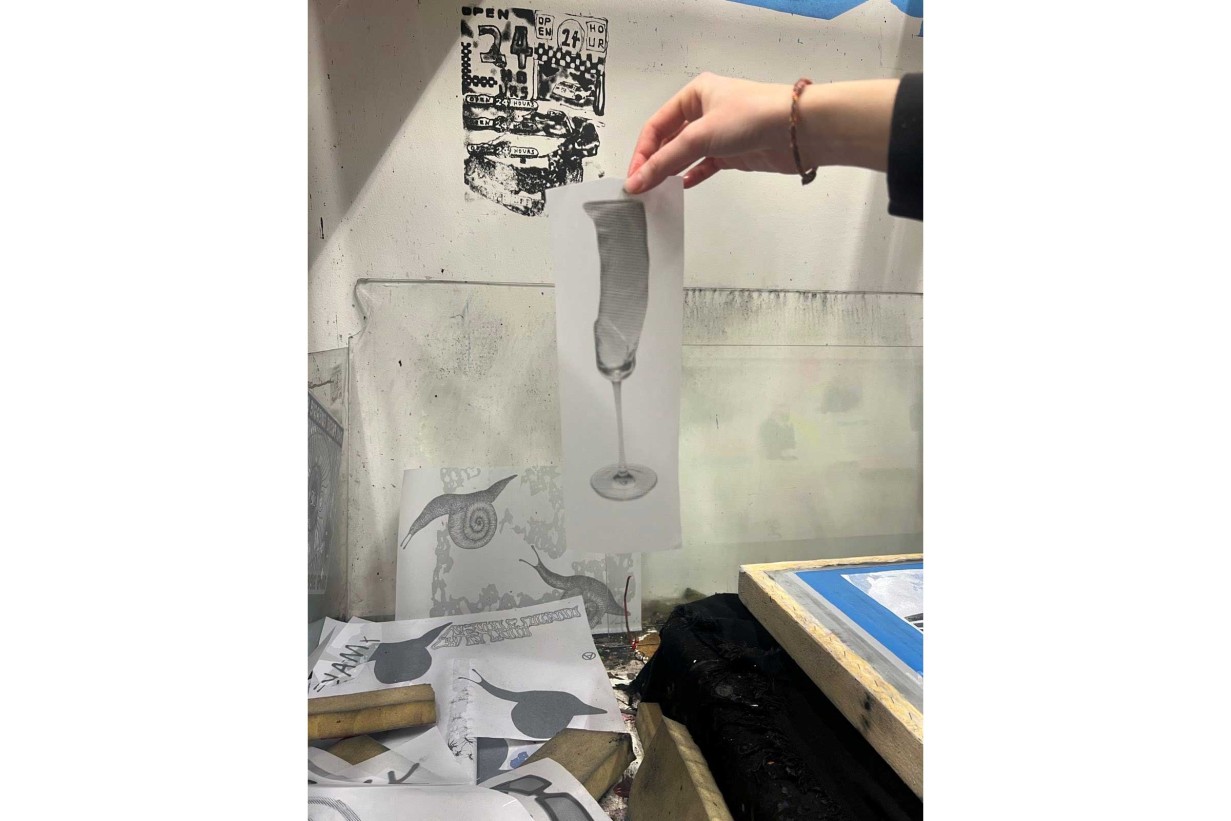 An imprint of a penis-shaped glass