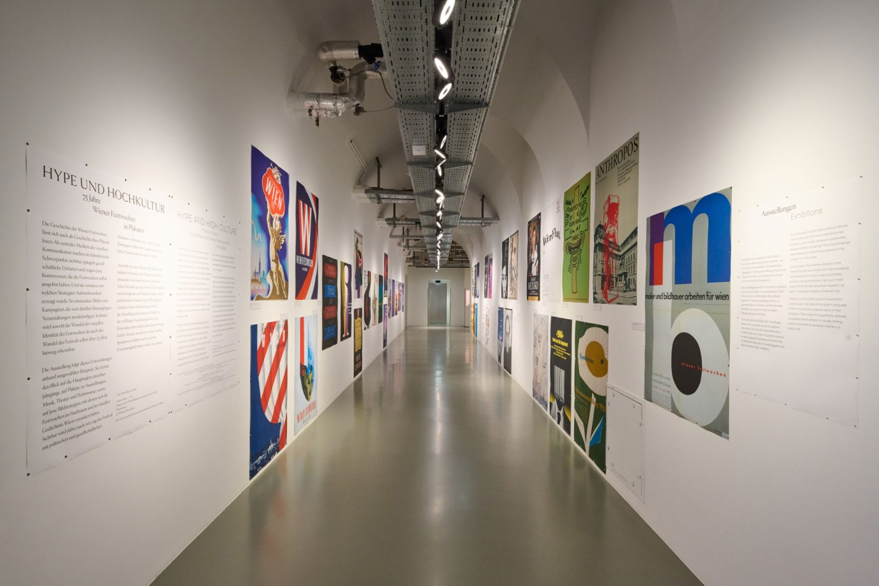 A hallway with Vienna Festival posters on the walls