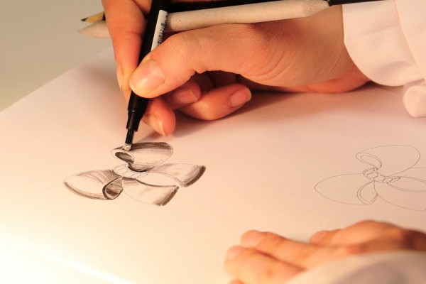 hand that draws the delicate graphics
