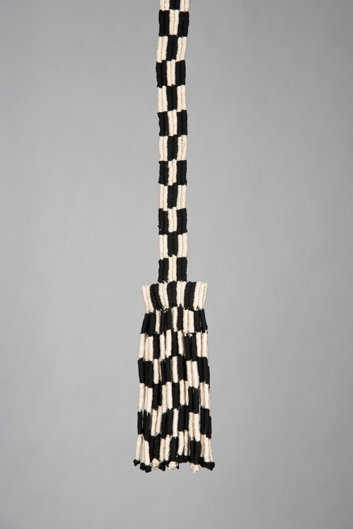 Quaste mit Schachbrettmuster