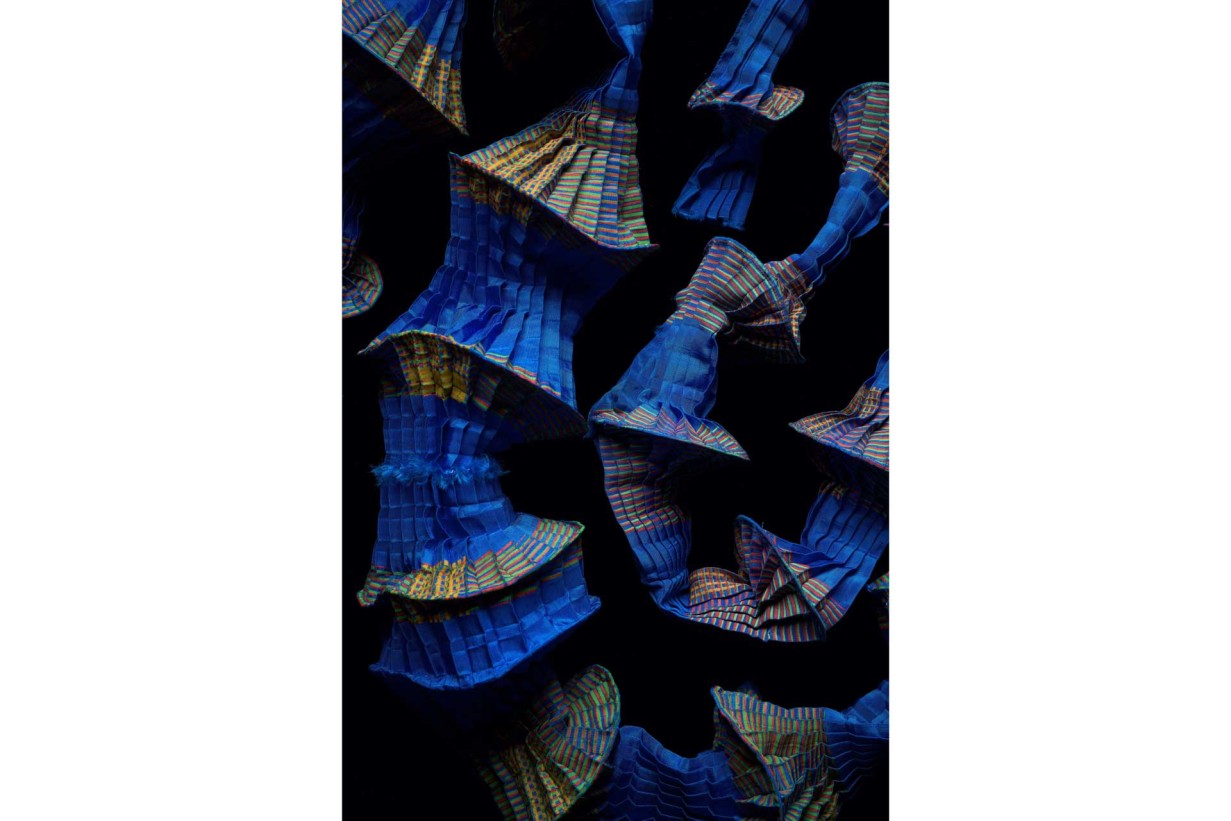 Synthetic fiber, pleated, printed; fishing line artfully draped in shades of blue