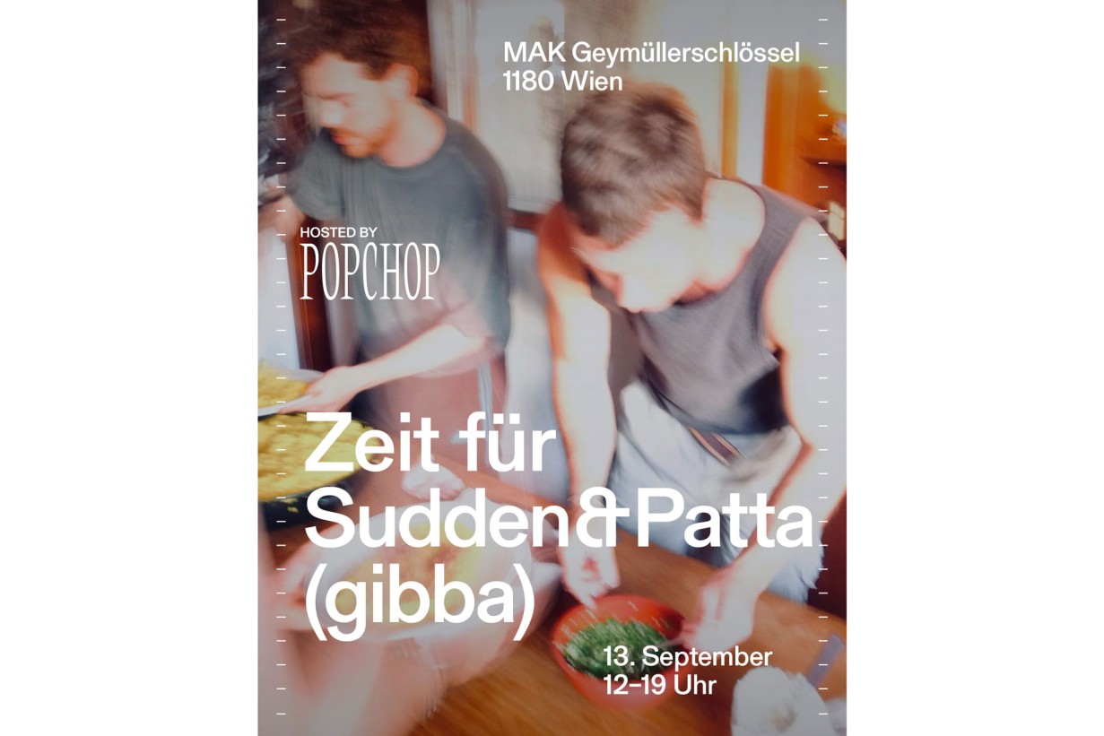 Zwei Männer bereiten Essen zu, verschwommen