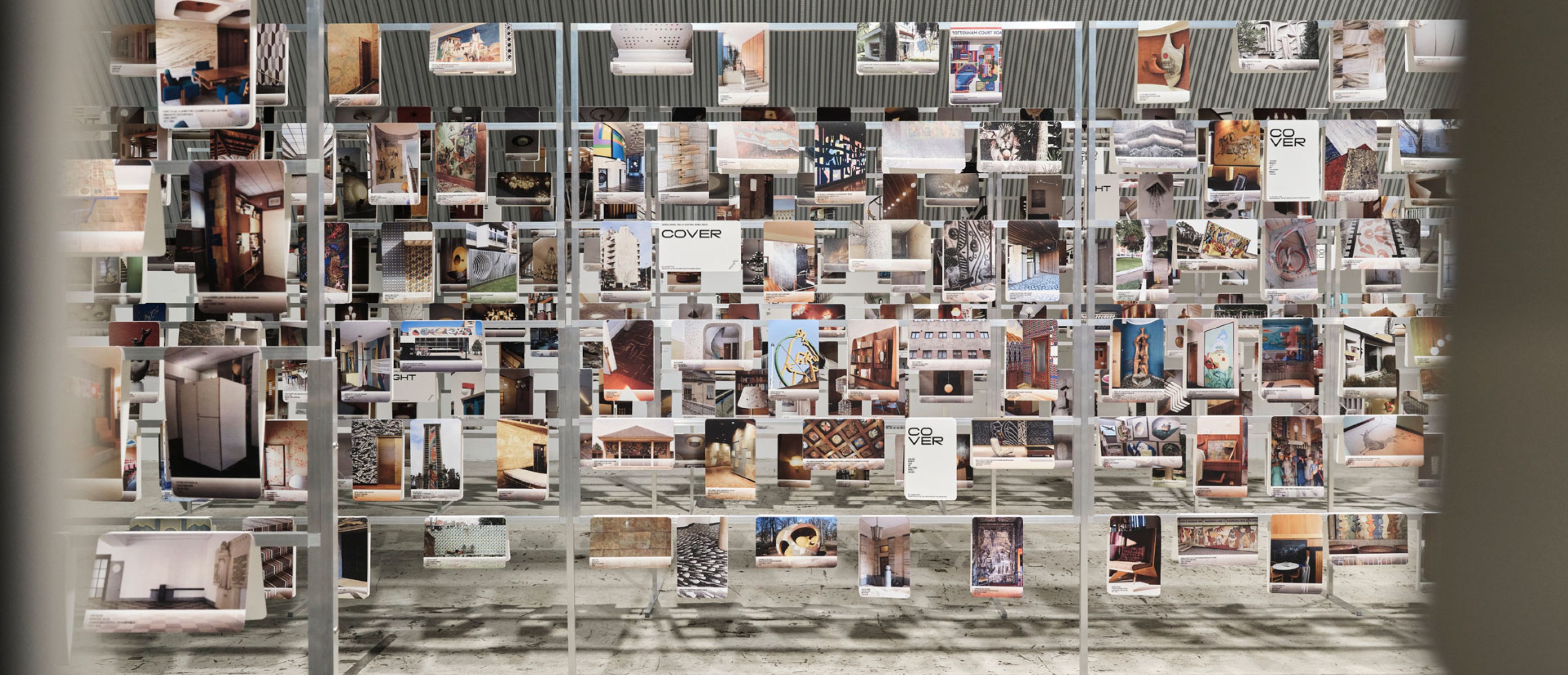 Exhibition view: Construction with numerous photos 