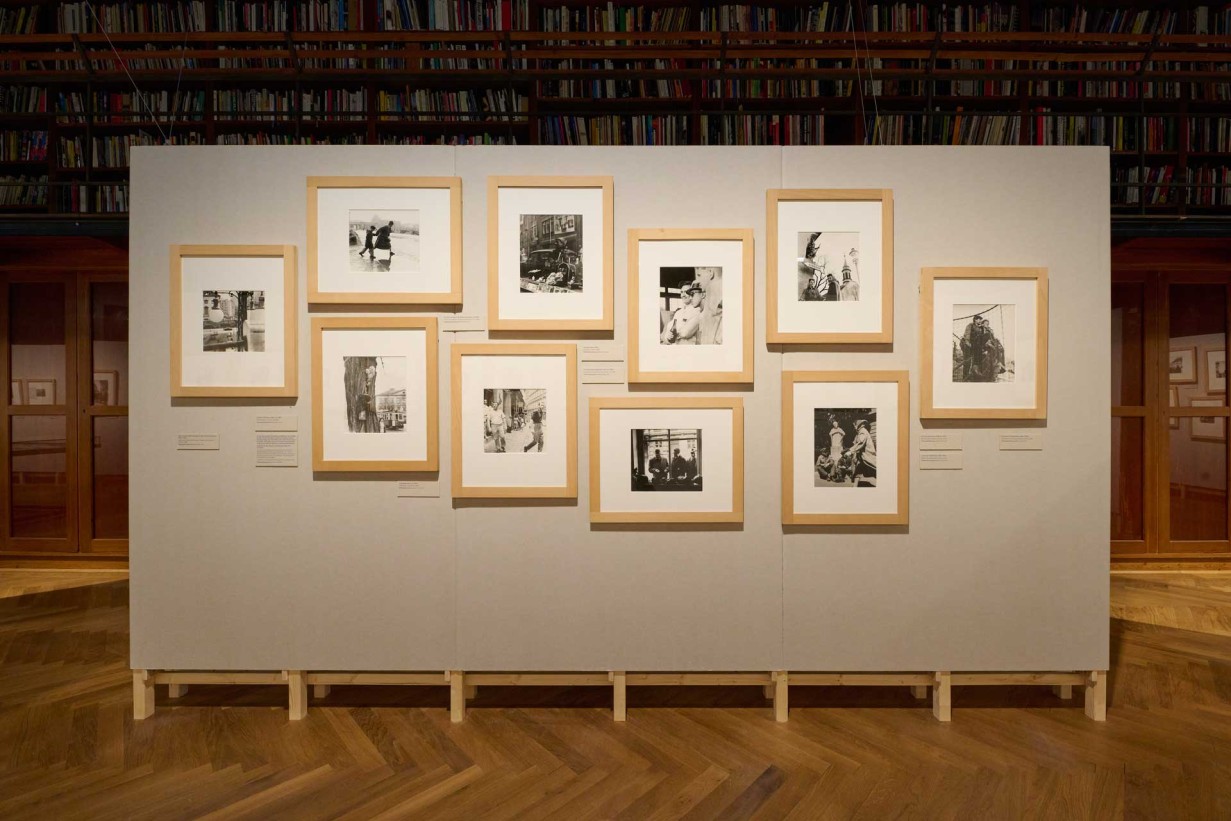 Wall in the exhibition featuring photographs by Barbara Pflaum