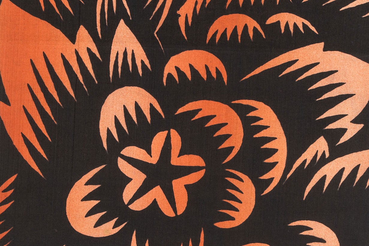 Grafische Darstellung von Blumen und Blättern, orange und schwarz