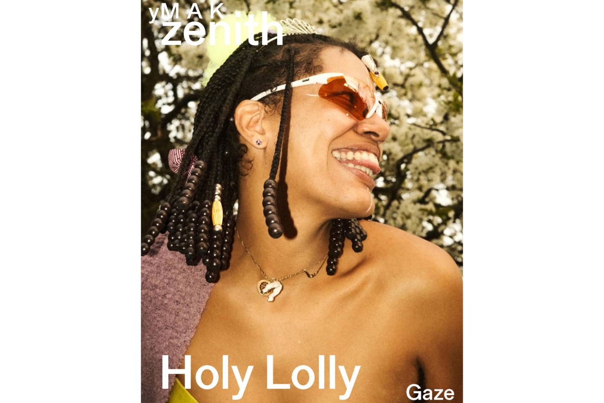 Woman with sunglasses laughs