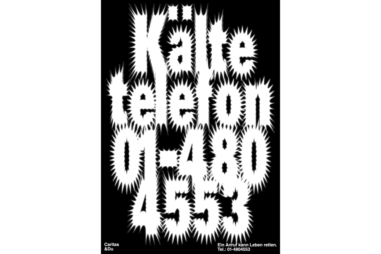 Black poster with telephone number and the word Kältetelefon, as if covered with icicles