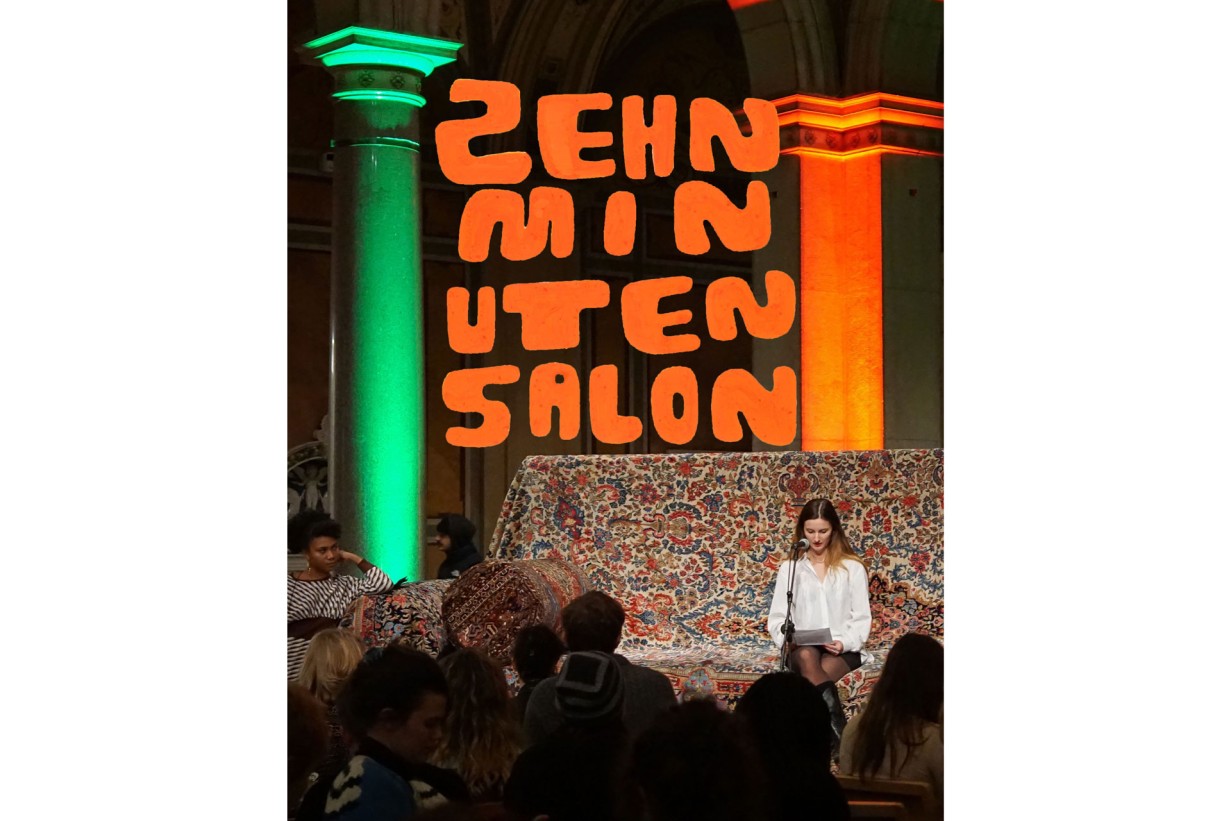 Person sitting on giant sofa reading