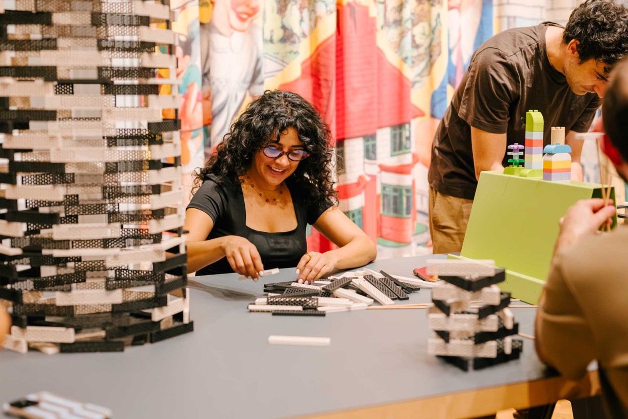 Visitors playing the exhibition ARCHITECTURAL CONSTRUCTION KITS