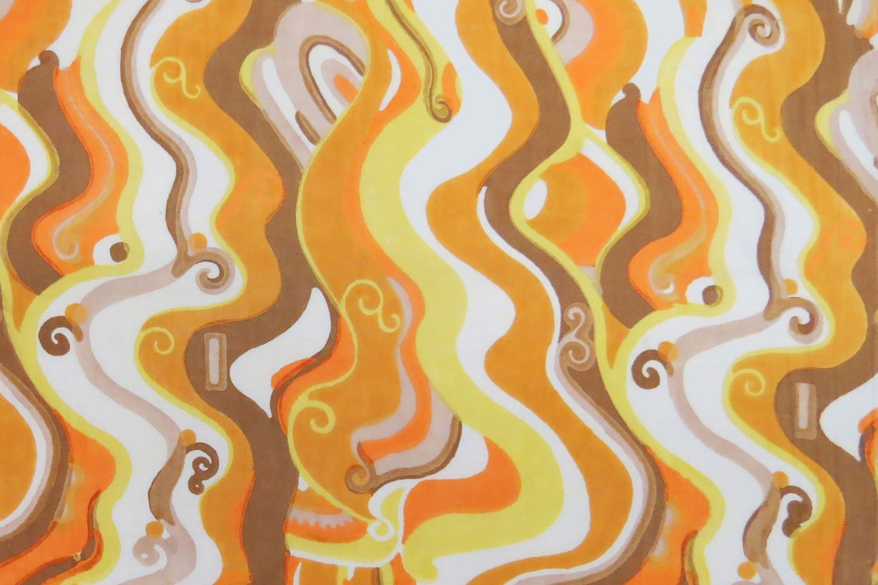 Ein orange-weißes Stoffmuster mit geschwungenen Linien