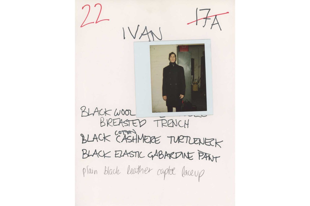 Show Fitting Polaroid on paper with handwritten look descriptions, depicted person: Iván de Pineda.