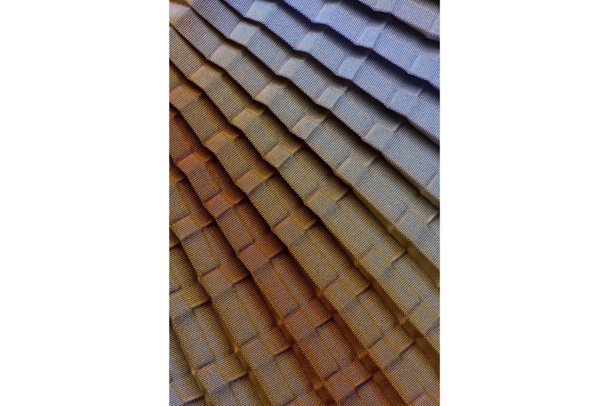 Fabric, pleated, stitched; metal hoop with gradient pattern