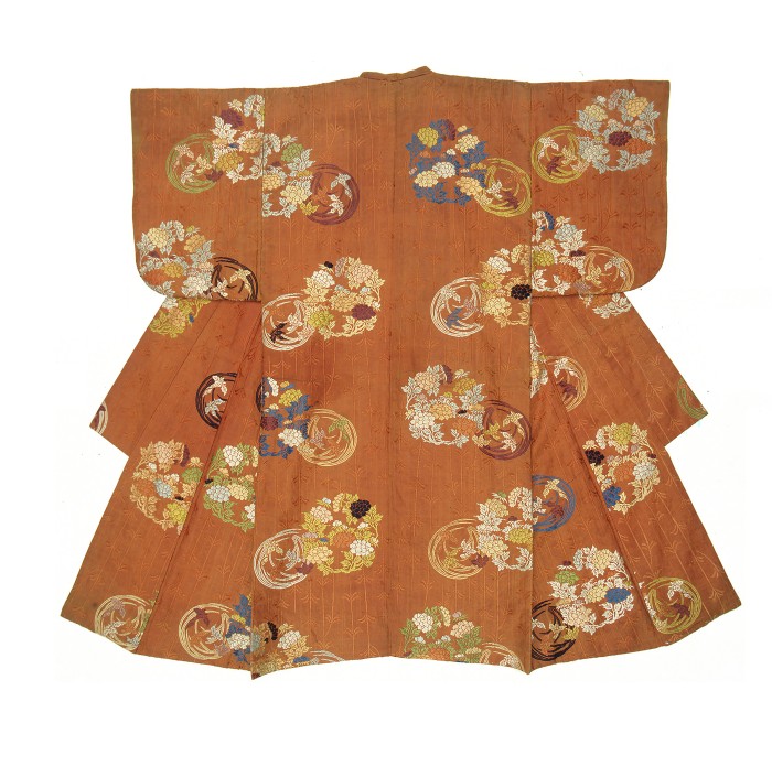 Kostüm in orangen Tönen