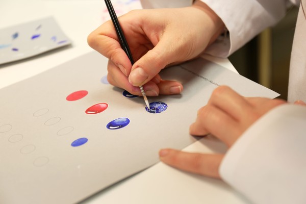 hand that draws the delicate graphics