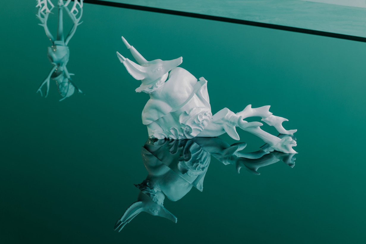 Water surface with a sculpture