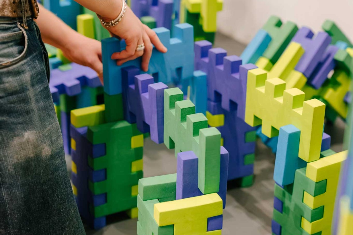 Visitors playing the exhibition ARCHITECTURAL CONSTRUCTION KITS