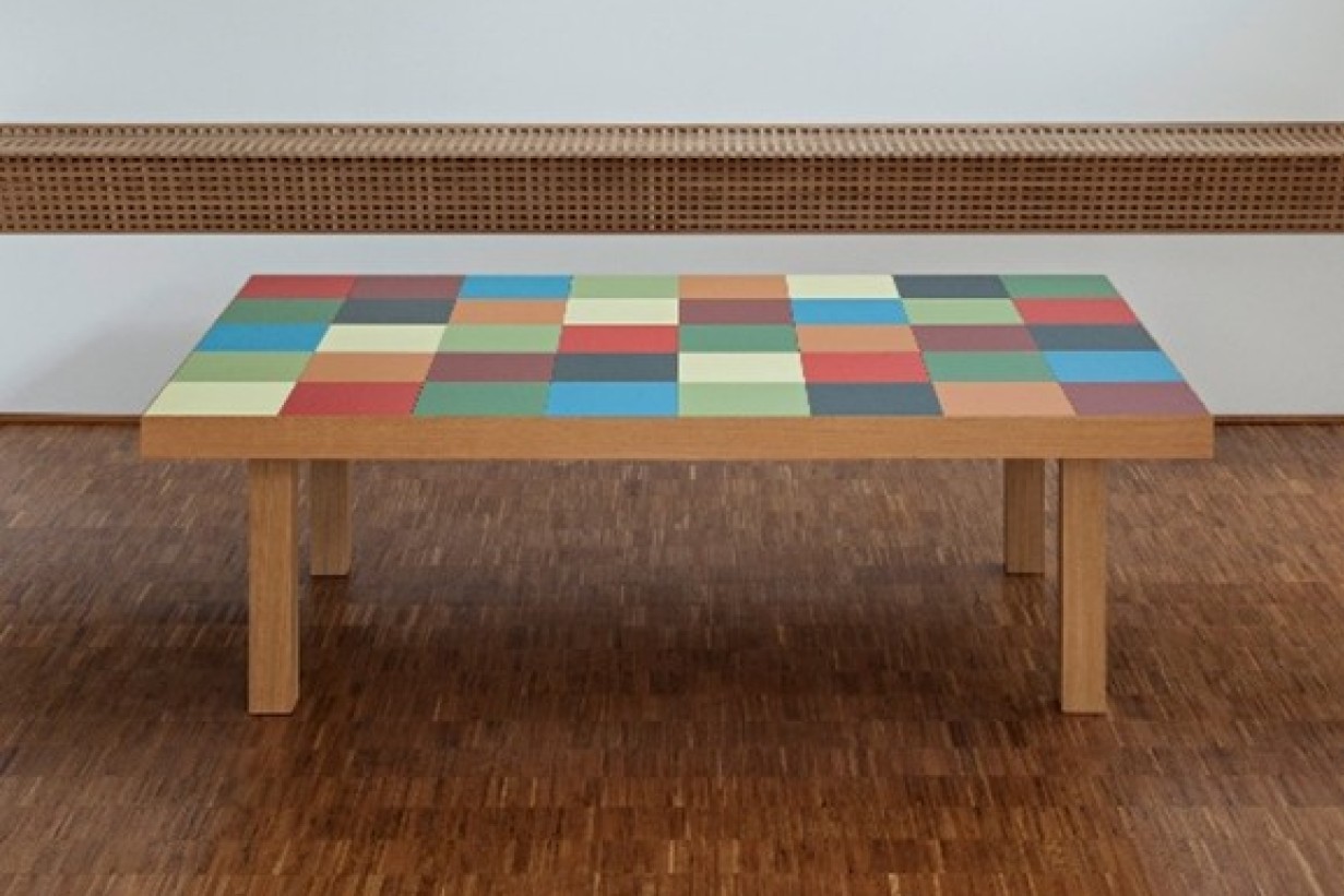 Table with a tabletop featuring colored squares